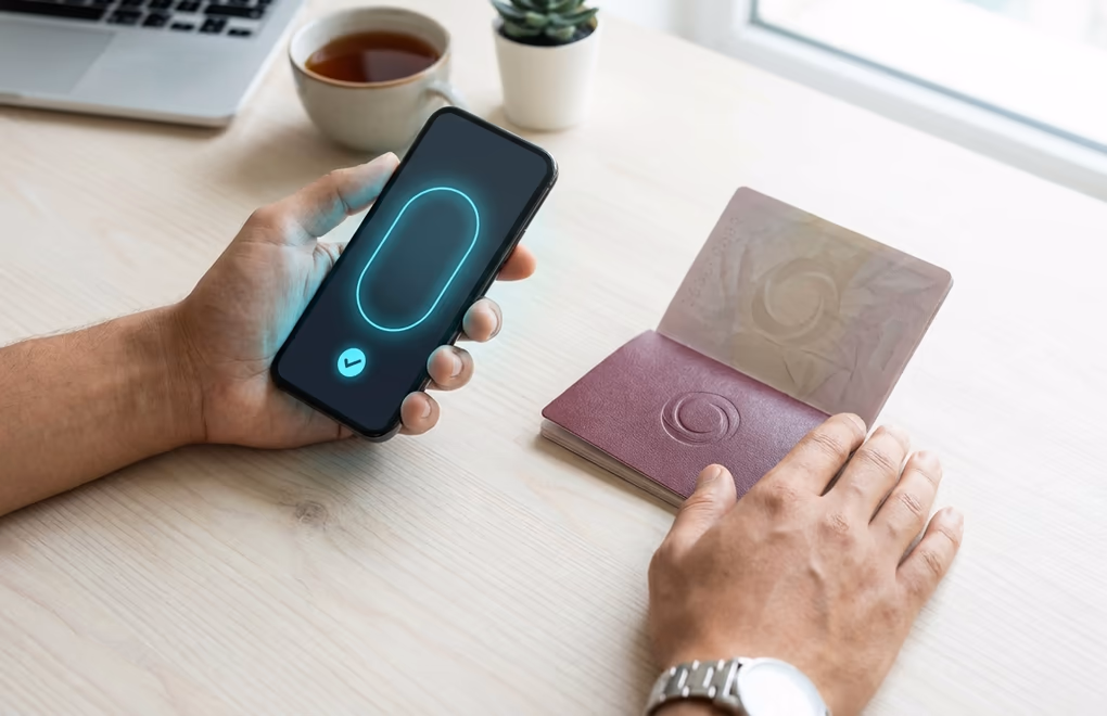 A passport and phone used to confirm identity during setup