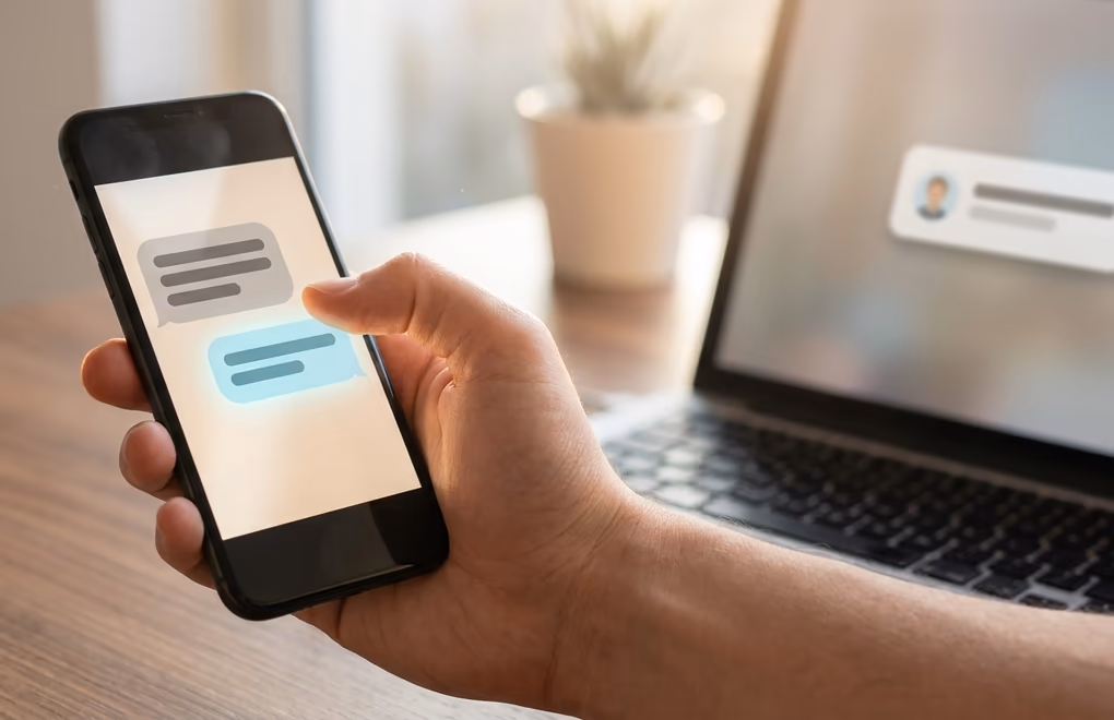 A short personal LinkedIn message earning a reply next to a prospect activity alert
